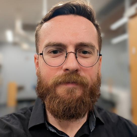 Headshot of Vladislav Frenkel