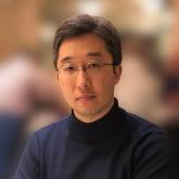 Joo H. Kim headshot cleaned