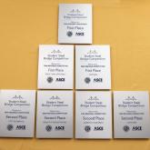 3 First Place and 4 Second Place plaques from the Steel Bridge Competition