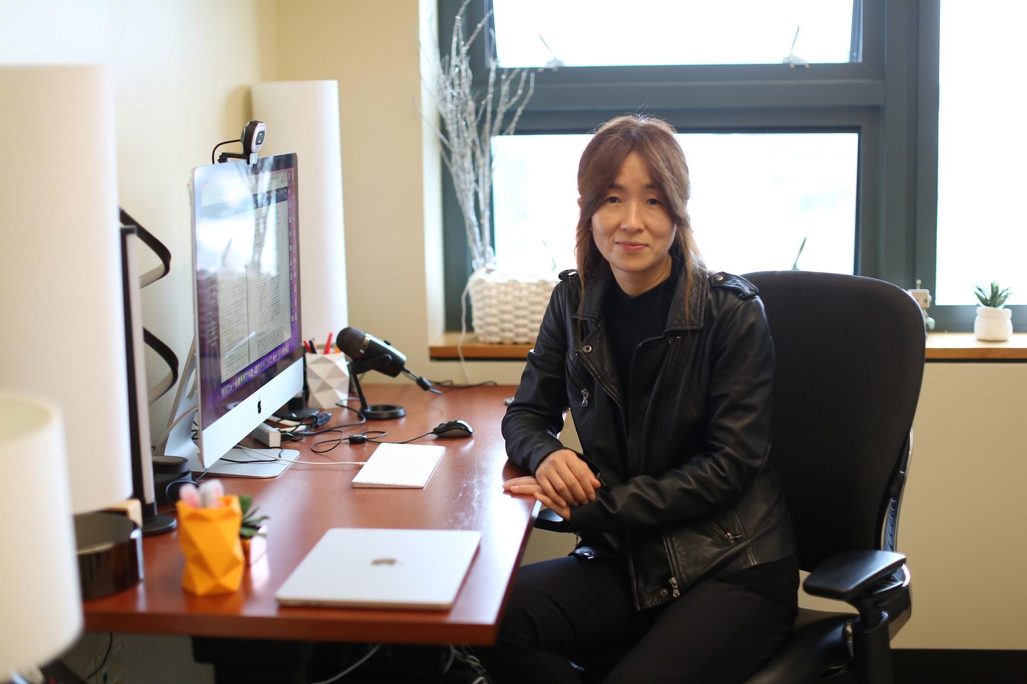 Computer scientist Yejin Choi sits at a desk. Full text in caption.