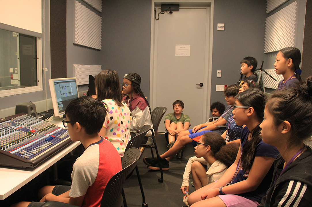 students in the audio booth