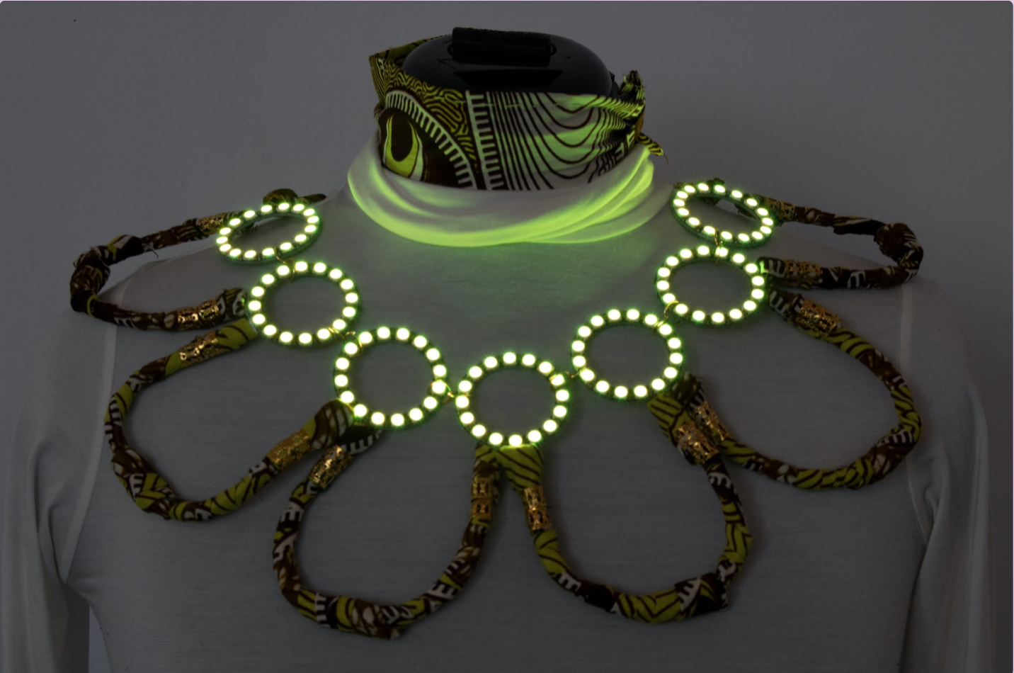 Large necklace with neon lights.