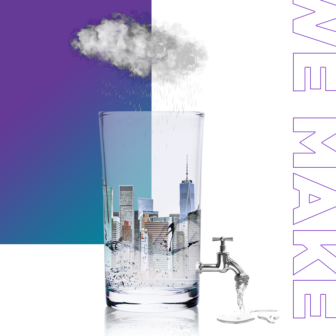 Glass of water with a city skyline in it.