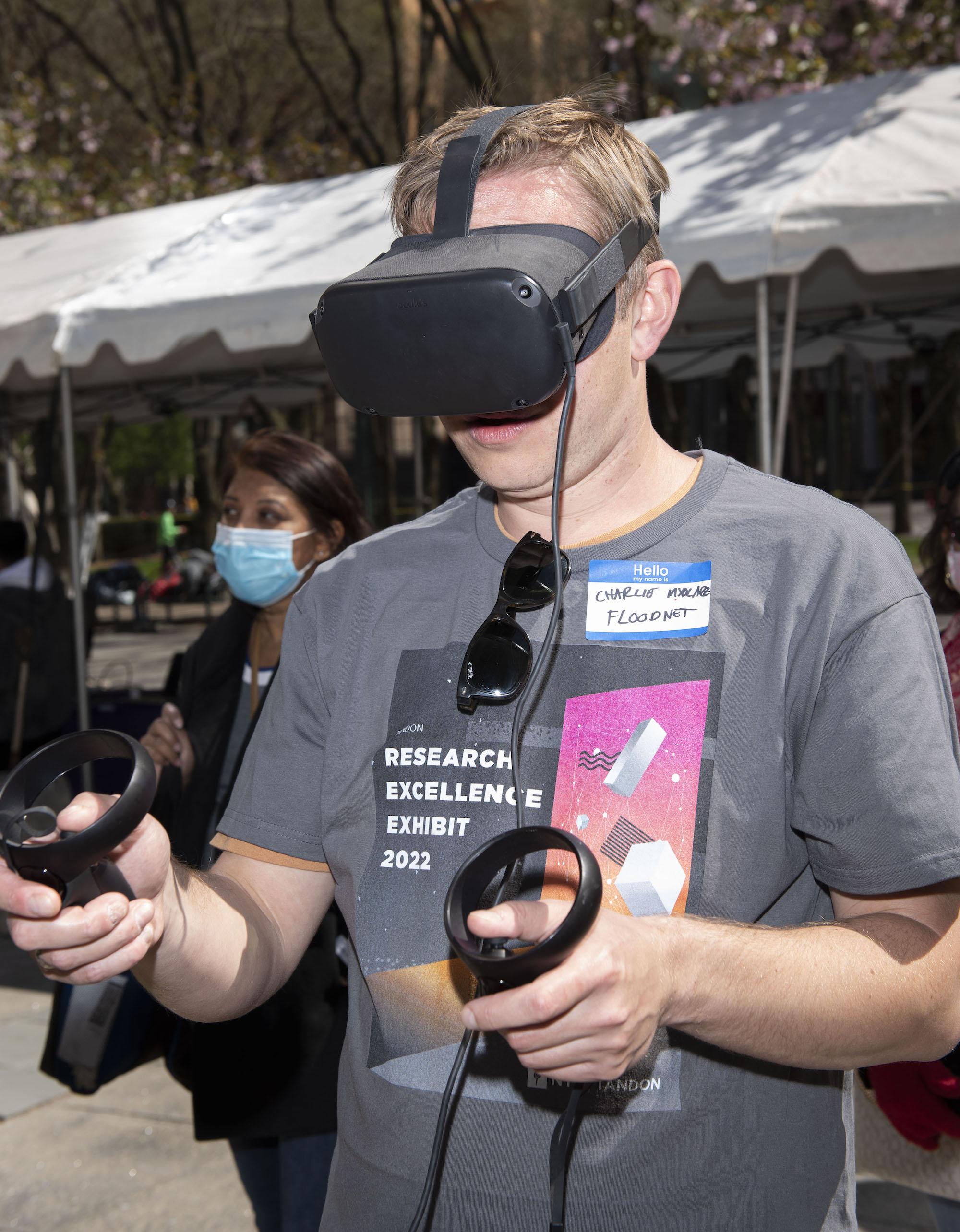 Person in expo t-shirt with VR headset on