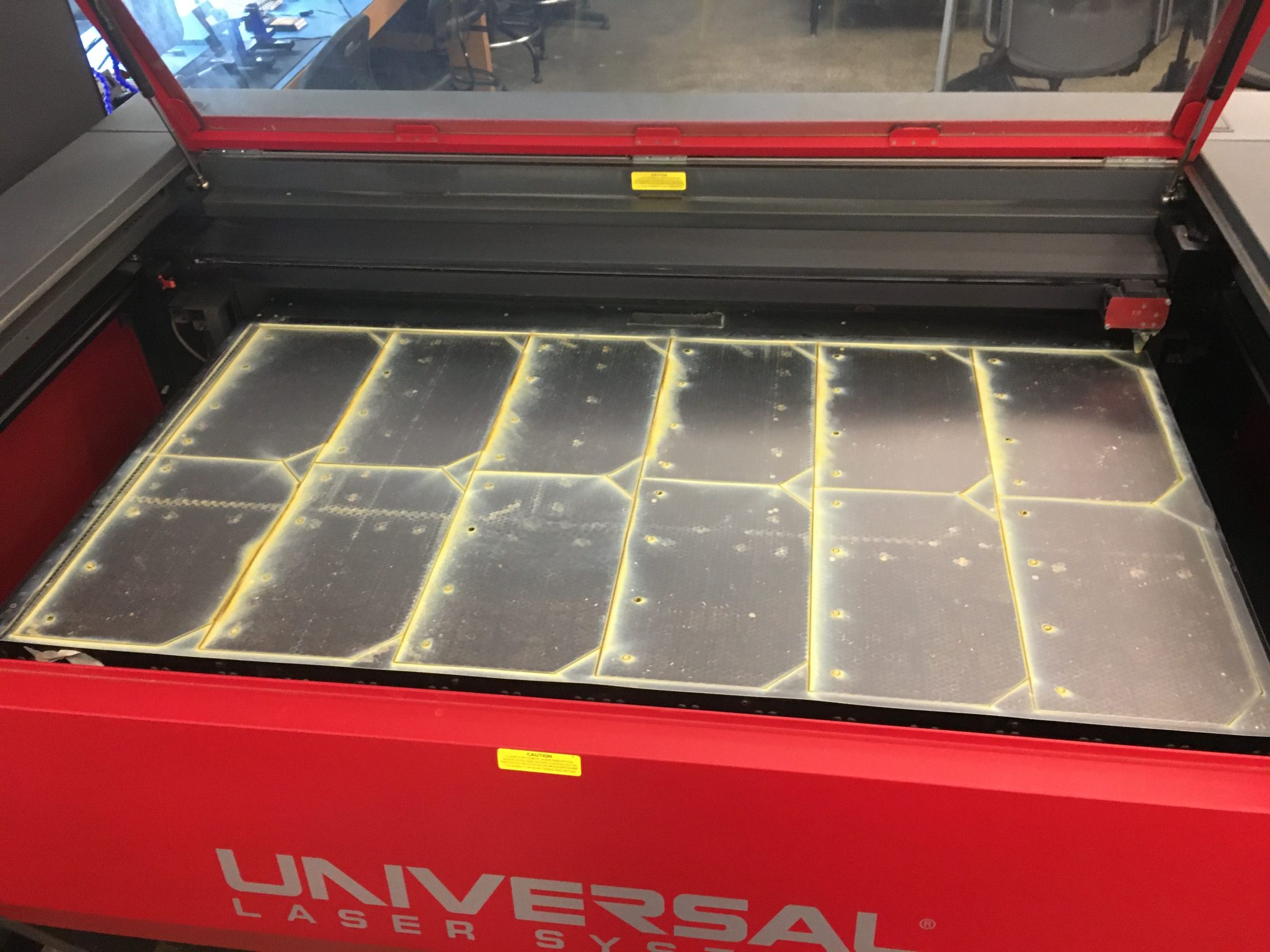 sheet of face shields being produced