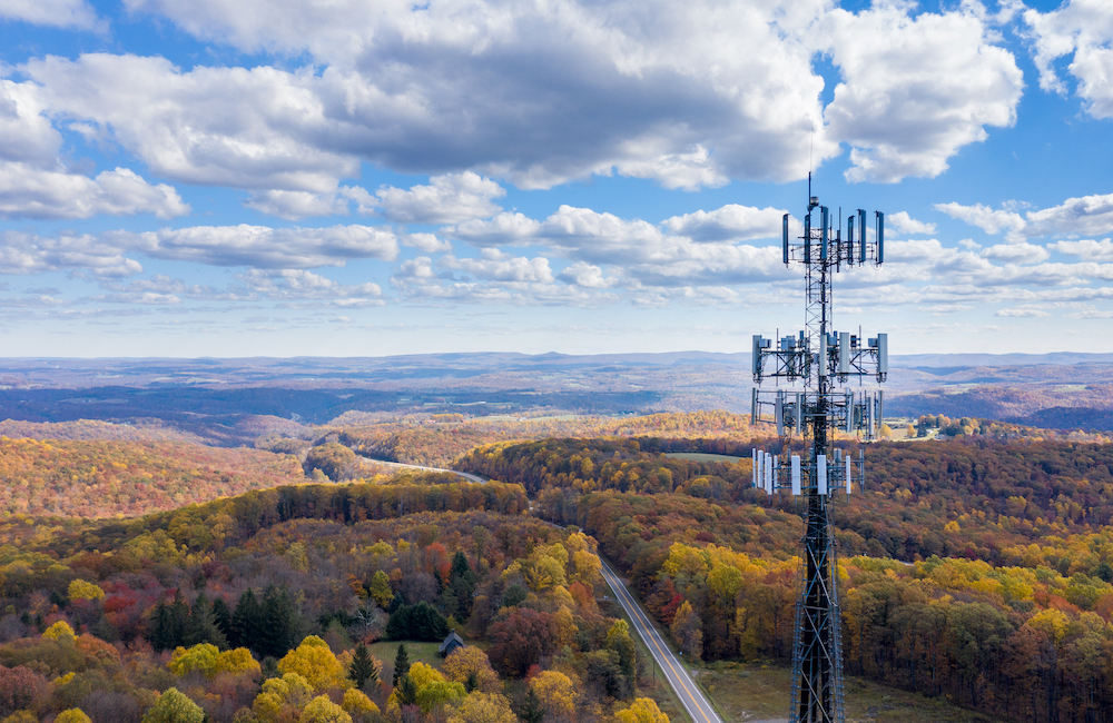 wireless tower with mountains in background